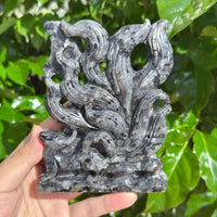 The Larvikaite Nine-Tailed Fox Carving, featuring a mystical fox with a detailed stone base.