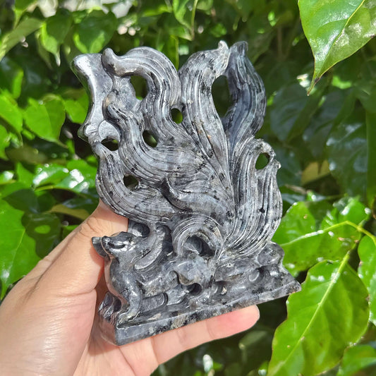 Larvikaite Nine-Tailed Fox Carving in vivid colors, capturing the stone’s natural patterns and fox design.