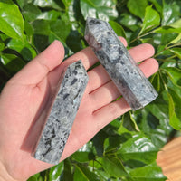 Single Larvikite tower with a polished finish, showcasing the beautiful texture and colors of the stone.