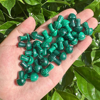 Collection of Malachite Mini Mushroom carvings, highlighting the unique designs and the natural luster of the stone.