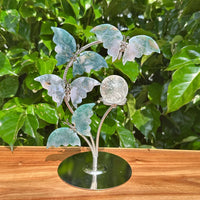 Beautifully crafted Moss Agate Butterfly Sphere Holder with detailed butterfly figures.