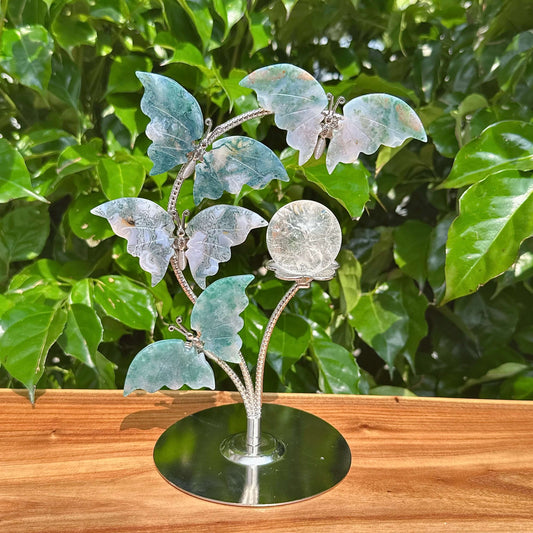 Beautifully crafted Moss Agate Butterfly Sphere Holder with detailed butterfly figures.