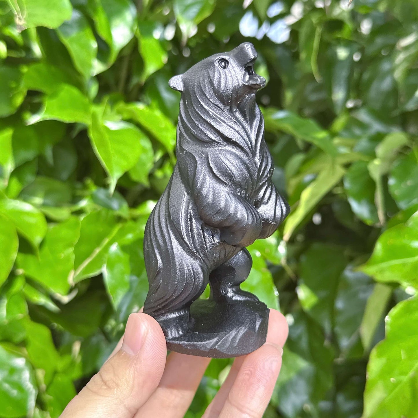 Back view of the Obsidian Capibara statue, highlighting the craftsmanship and polished surface of the obsidian.