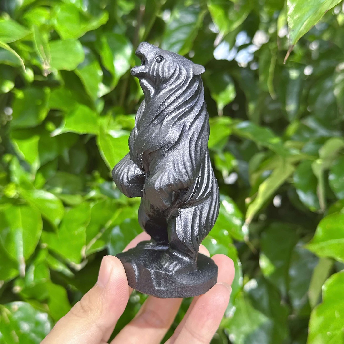 A detailed look at the Obsidian Capibara statue, featuring the fine craftsmanship and glossy finish.