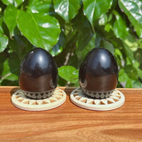 High-quality obsidian egg carving for display, designed with a glossy finish to add elegance to any collection.
