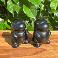 Obsidian Godzilla Carving showcasing detailed features of Godzilla with a sleek black finish and intricate carving details.