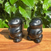 Side view of Obsidian Godzilla Carving, emphasizing the fine craftsmanship and polished black surface.