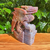 Closeup of the Ocean Jasper Dragon Carving's textured scales and vibrant color contrasts.