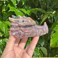 Front view of the Ocean Jasper Dragon Head Carving showing intricate details.
