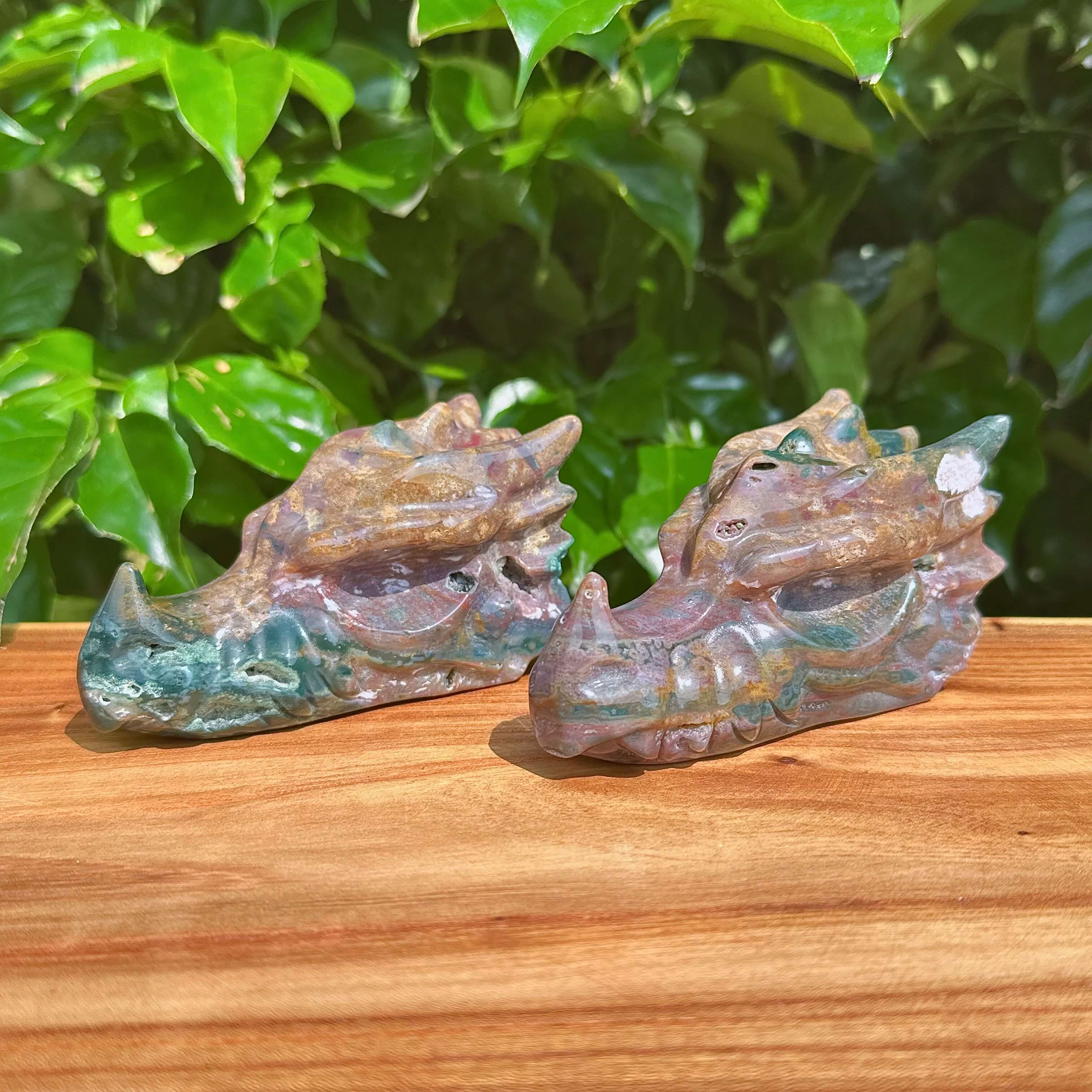 Unique Ocean Jasper Dragon Head Carving with polished finish and natural color variations.