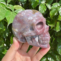 Ocean Jasper skull carving featuring natural earthy tones and intricate detailing, ideal for home decor.