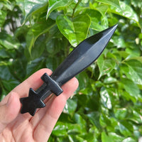 Two Pentagram obsidian swords showcasing the star hilt and sharp obsidian blade.