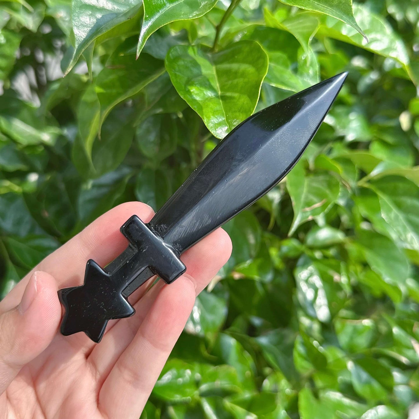 Two Pentagram obsidian swords showcasing the star hilt and sharp obsidian blade.