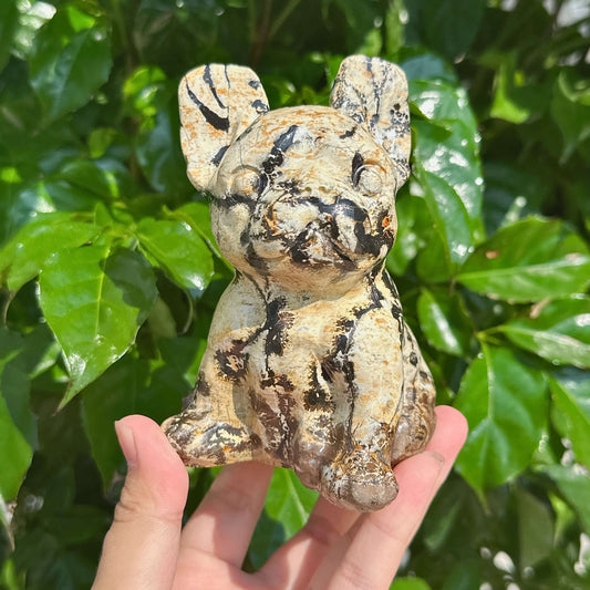 Side profile of a Picture Jasper French Bulldog carving showcasing its unique texture.