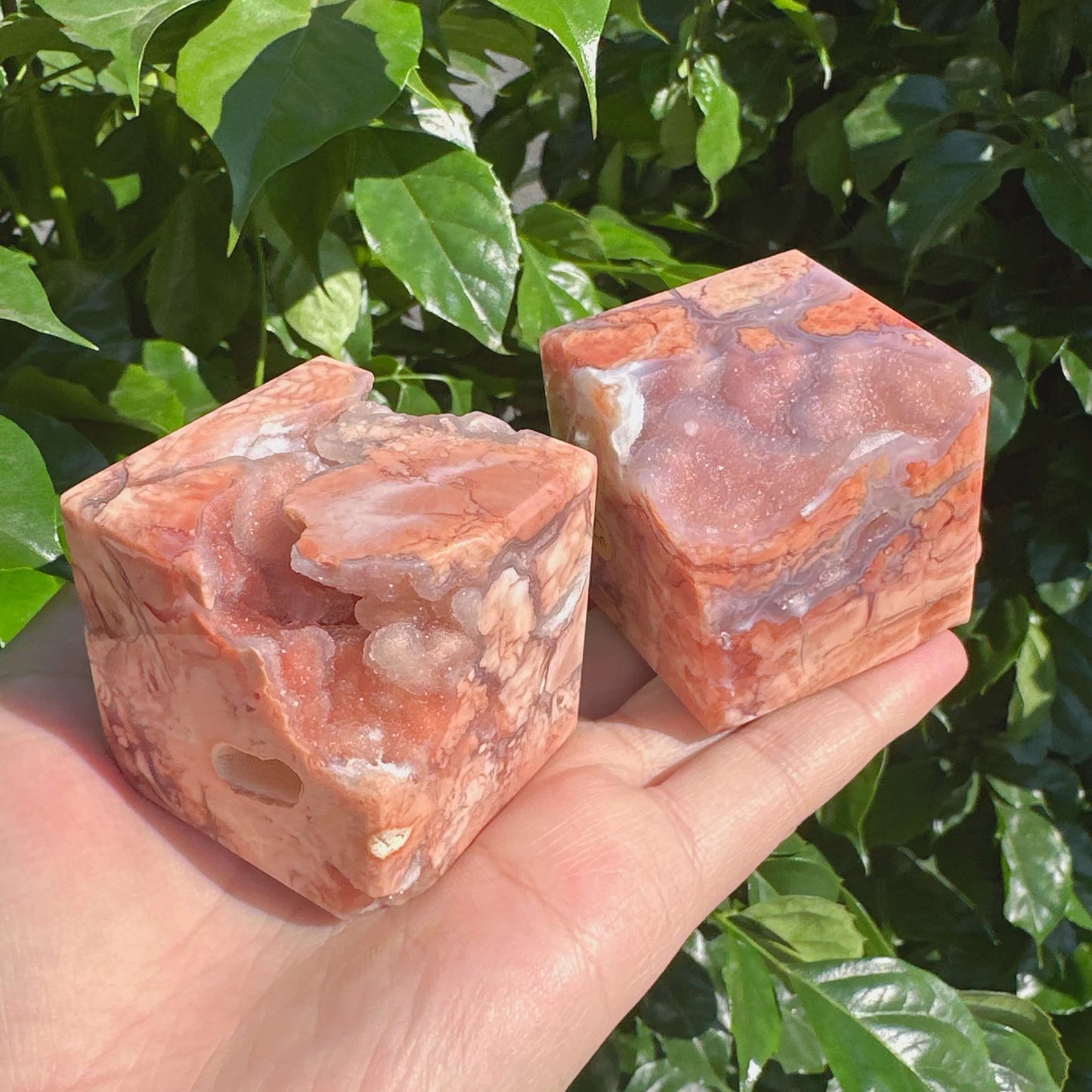 Back view of Pink Agate Cube, showcasing its smooth finish and natural agate layers.