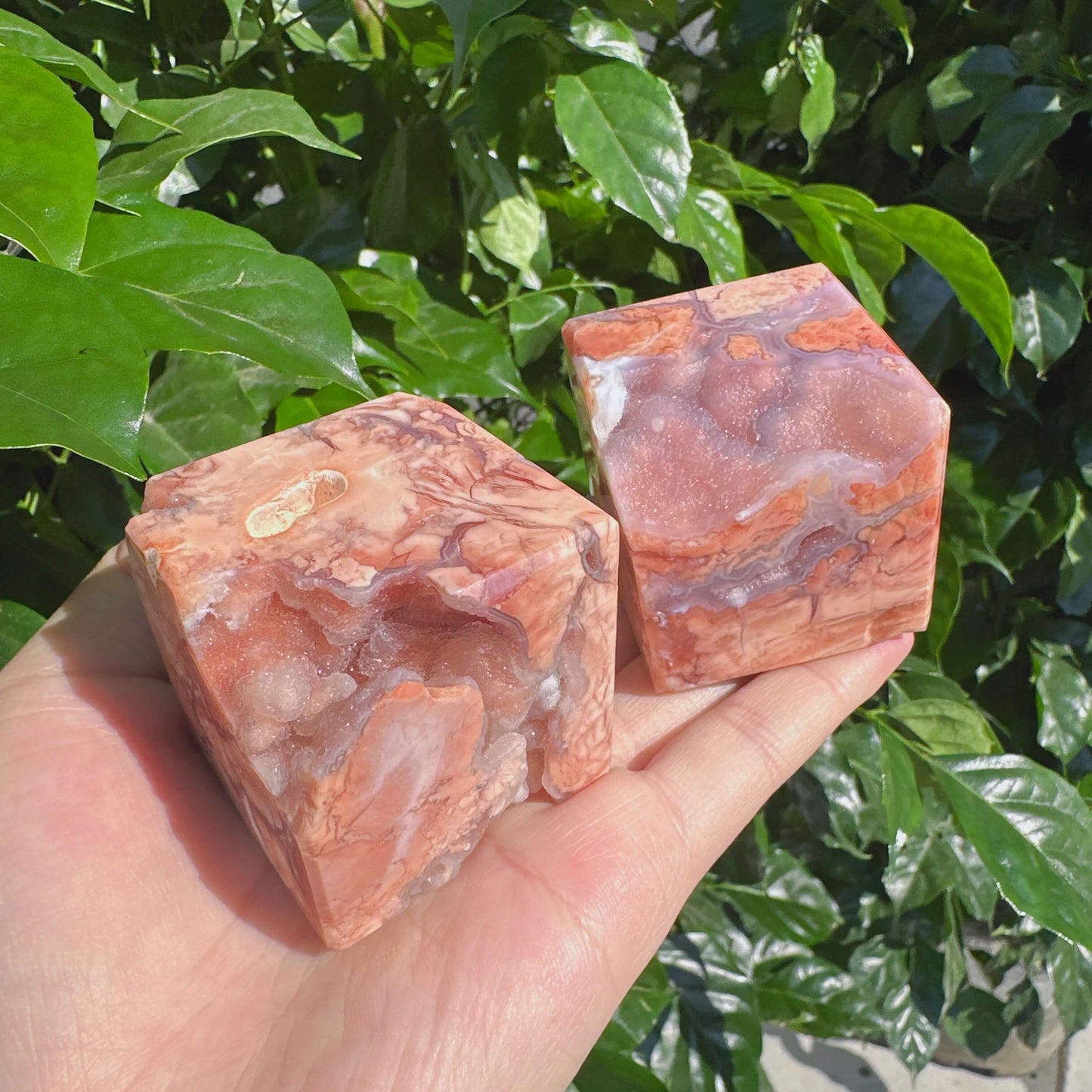 Another detailed view of Pink Agate Cube, revealing the beautiful natural crystal patterns and glossy surface.