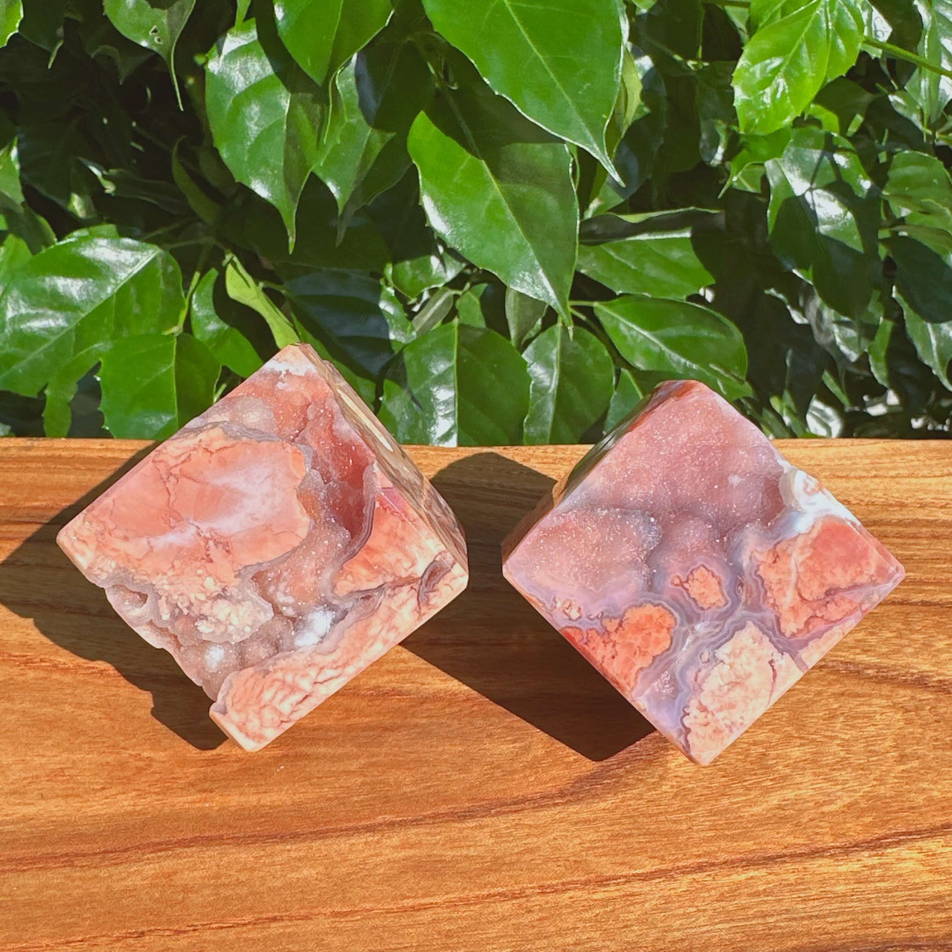 Side view of Pink Agate Cube, highlighting the intricate texture and natural beauty of the crystal.