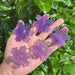 Purple Fluorite Snowflake with intricate patterns and crystal clarity.
