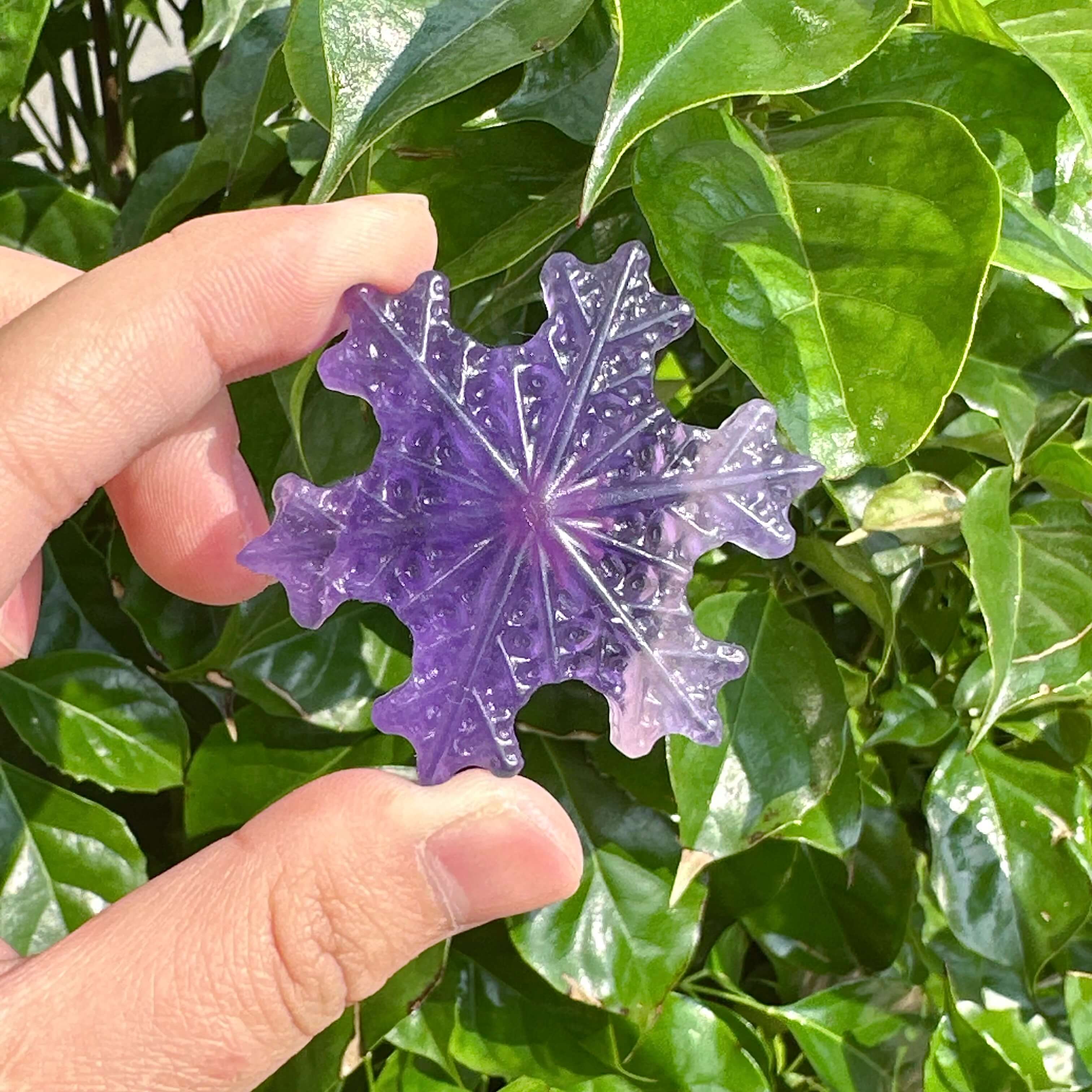 Close-up of Purple Fluorite Snowflake with unique natural details.