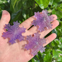 Elegant and translucent Purple Fluorite Snowflake with natural violet hues.