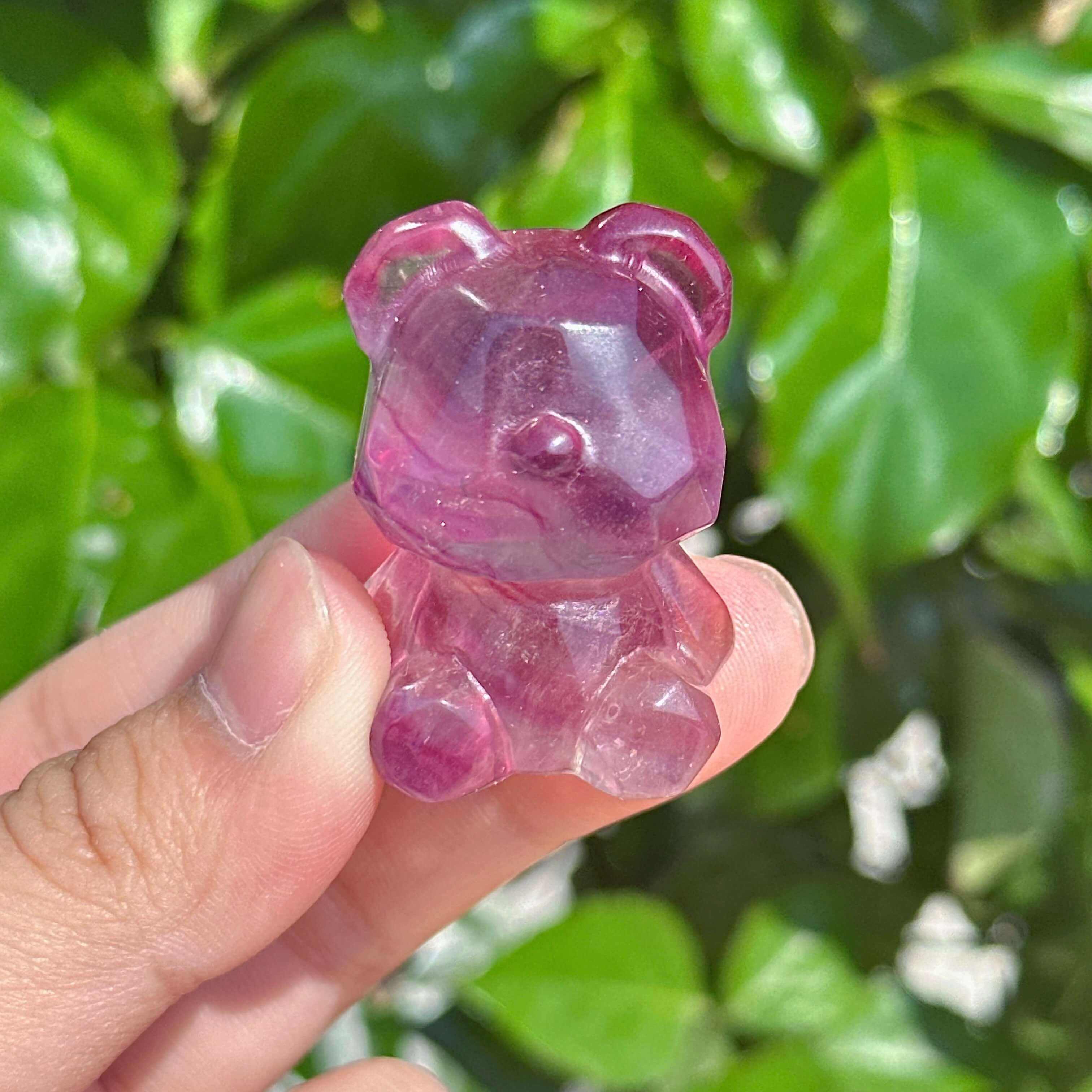 Rainbow Fluorite Bear Carving showing a different angle with brilliant color variations.