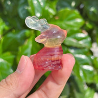 Handcrafted Rainbow Fluorite Deer Carving – Unique crystal deer figurine showcasing gradient colors from pink to green.