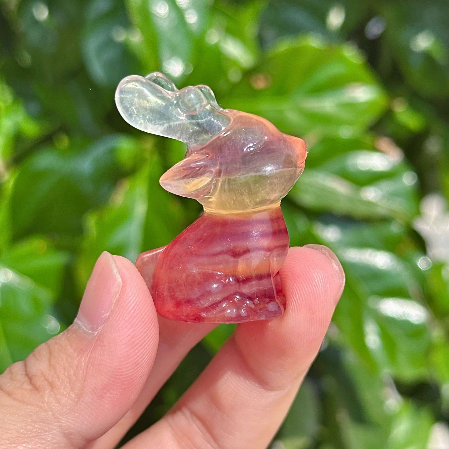 Handcrafted Rainbow Fluorite Deer Carving – Unique crystal deer figurine showcasing gradient colors from pink to green.