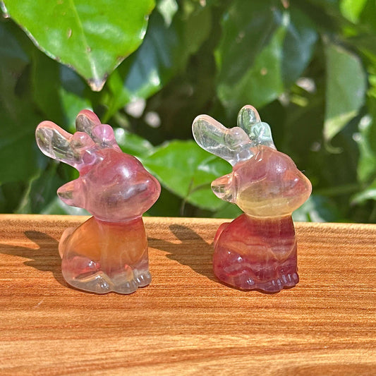 Rainbow Fluorite Deer Sculpture – A delicate crystal carving with intricate details and a vibrant color blend, perfect for display.
