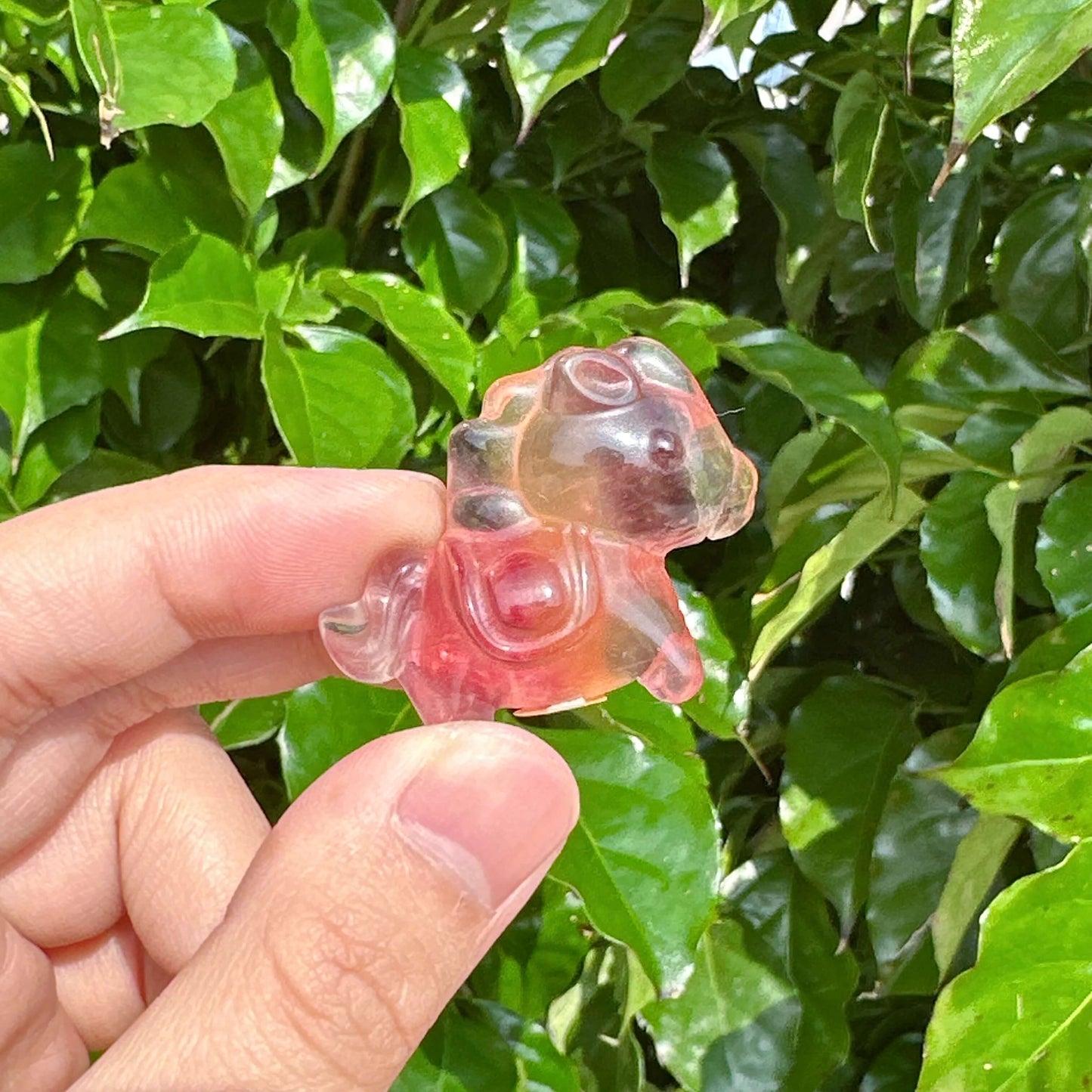 Beautifully carved Rainbow Fluorite Mini Horse crystal sculpture with translucent hues.