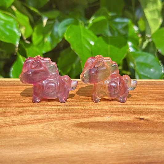 Close-up view of Rainbow Fluorite Mini Horse with detailed carving and vibrant color gradients.