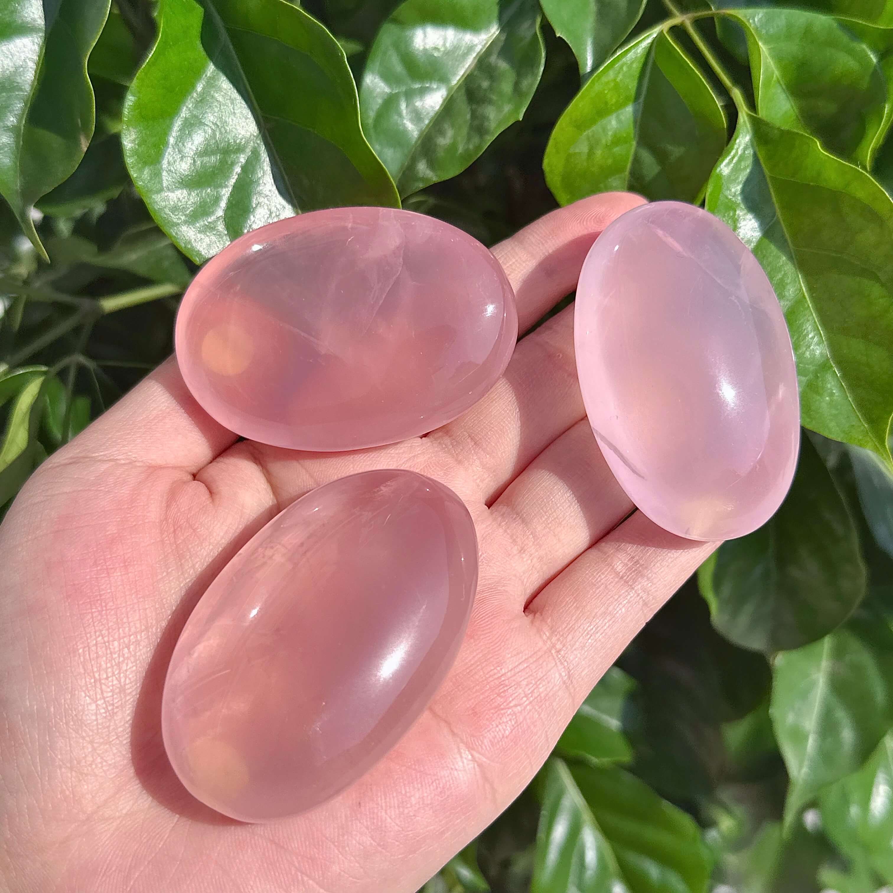 Rose Quartz Palm crystal showcasing soft pink hues, ideal for emotional healing and self-love.