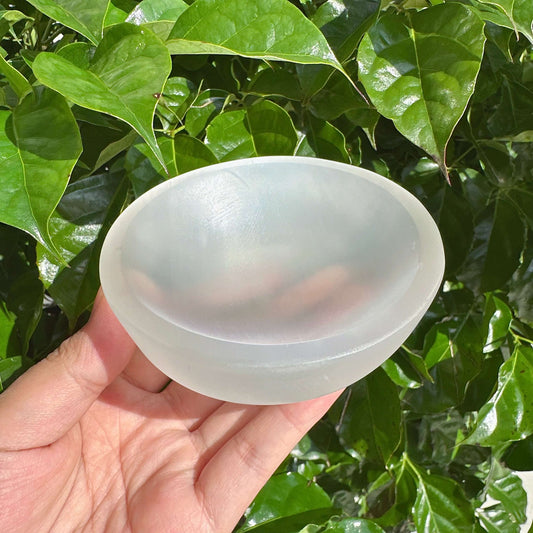 Selenite Crystal Bowl with round shape, promoting positive energy and tranquility, ideal for holistic healing.