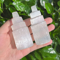 Close-up of a Selenite Tower with detailed texture and natural edges, showcasing its elegant clarity and energetic properties.