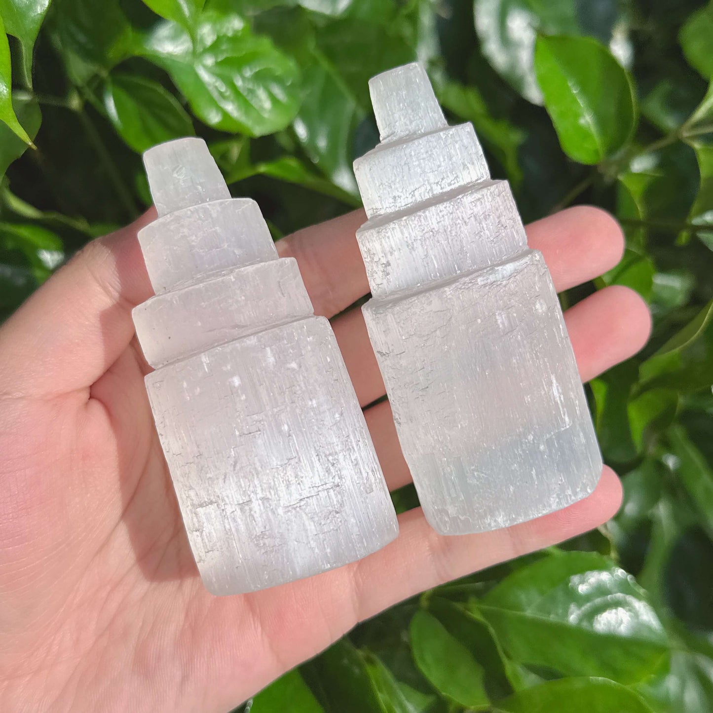 Close-up of a Selenite Tower with detailed texture and natural edges, showcasing its elegant clarity and energetic properties.