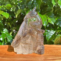 Smoky Quartz Dragon Carving with detailed wings and scales.