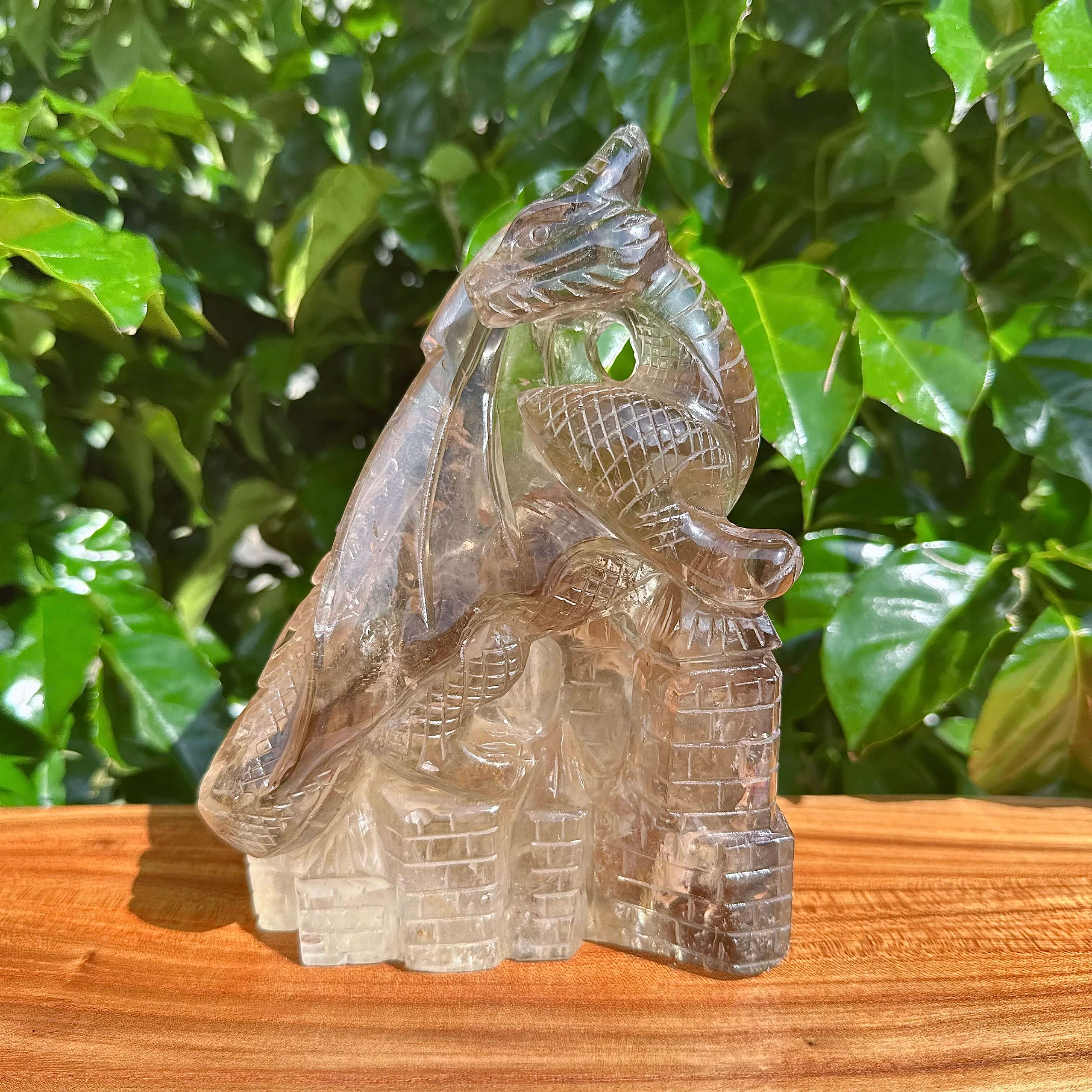Smoky Quartz Dragon Carving with detailed wings and scales.