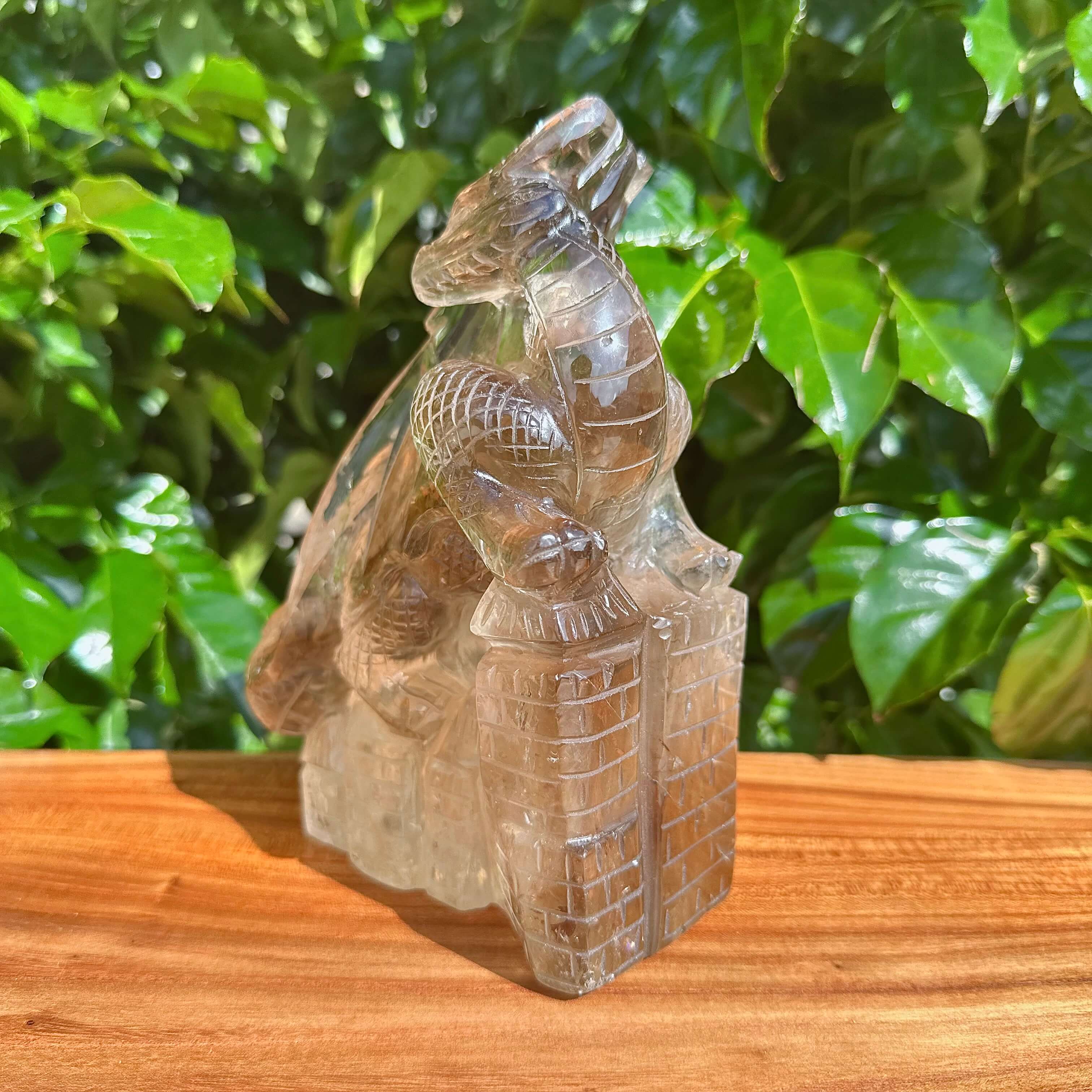 Full view of the Smoky Quartz Dragon Carving with an intricate design and crystal features.