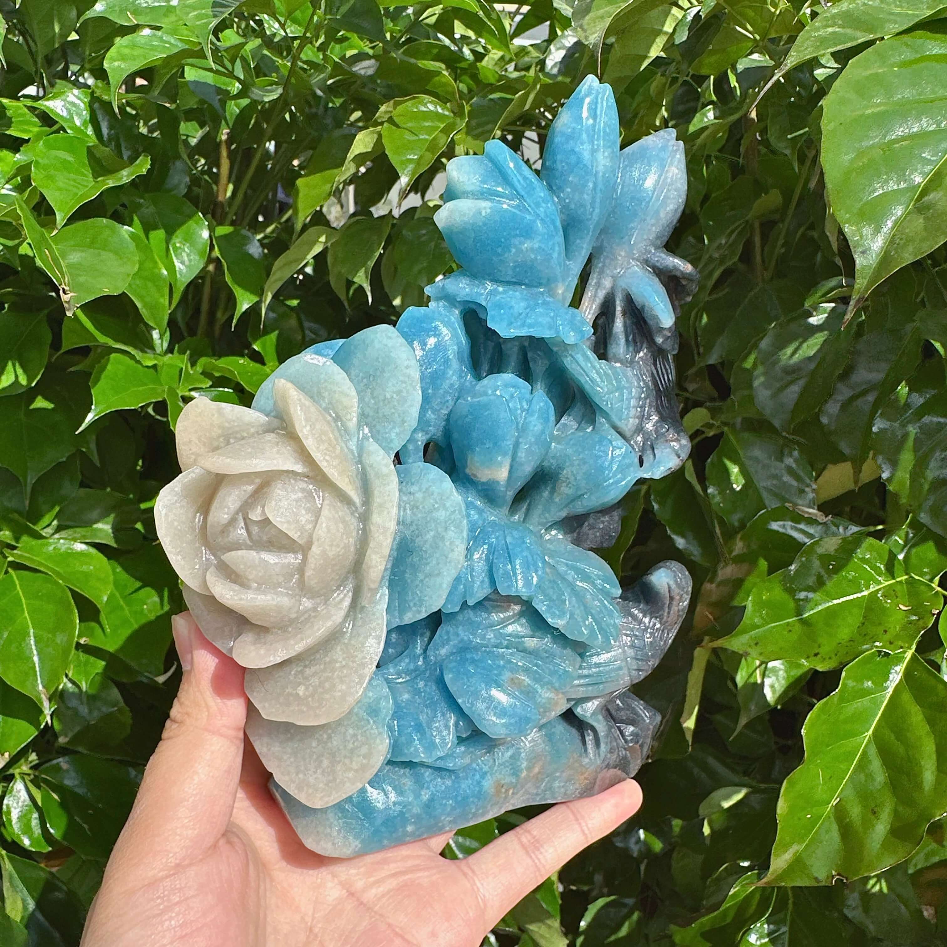 Back view of the Trolleite Flower and Bird Carving, revealing the intricate layers and artistic representation of nature in this handcrafted sculpture.