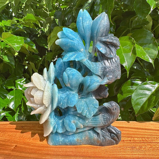 Front view of the Trolleite Flower and Bird Carving, showcasing intricate floral and bird details with a soothing color palette.