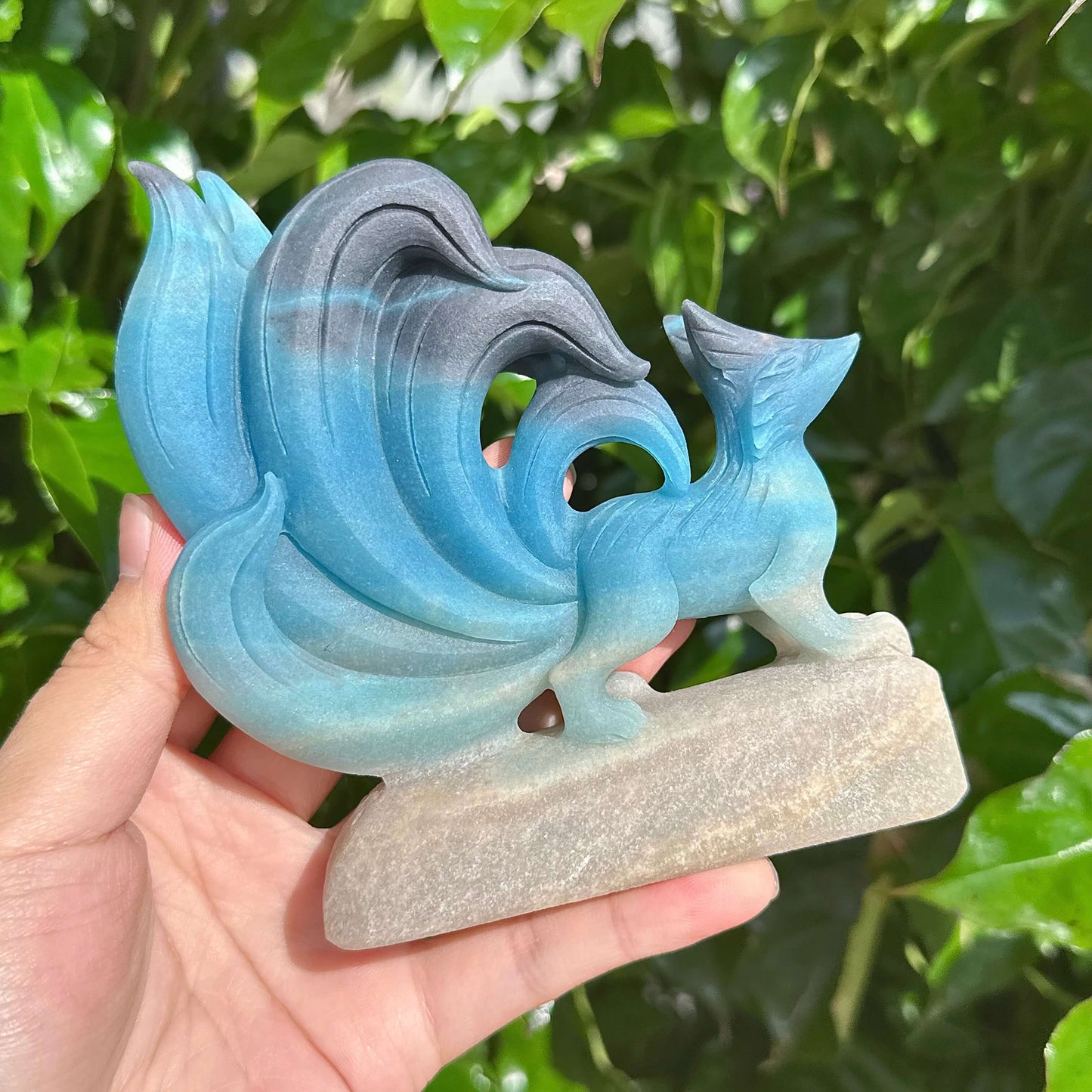 Stunning view of Trolleite Nine-Tailed Fox Carving with its beautifully carved tail and sharp features
