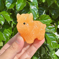 Yellow Calcite Highland Cattle Carving – Back view highlighting the smooth crystal surface and craftsmanship.