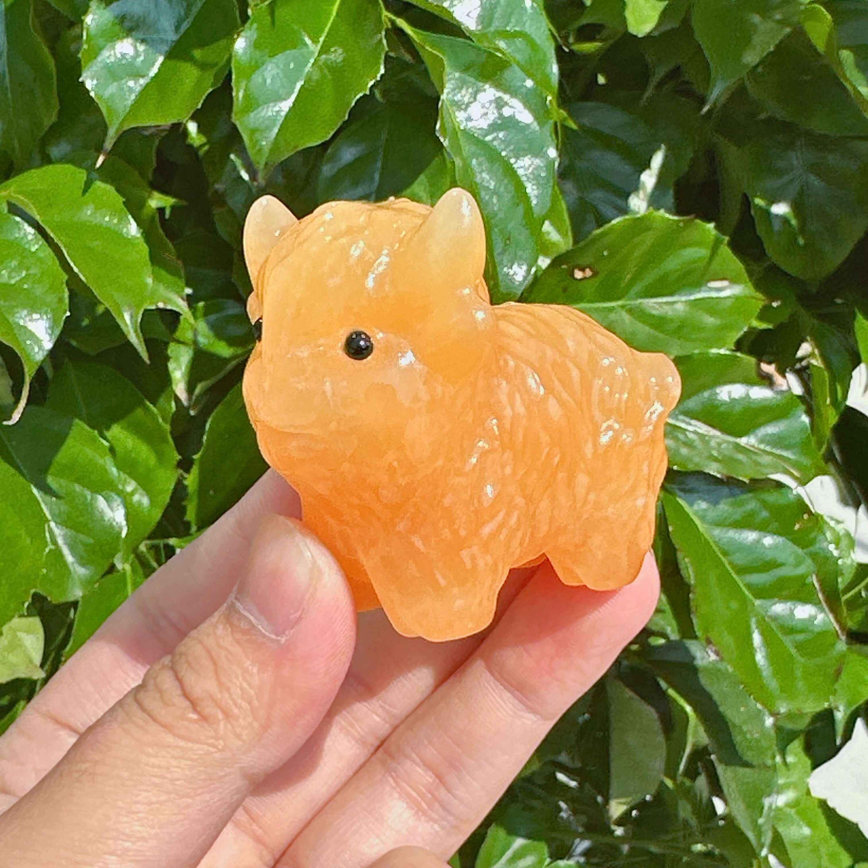 Yellow Calcite Highland Cattle Carving – Back view highlighting the smooth crystal surface and craftsmanship.